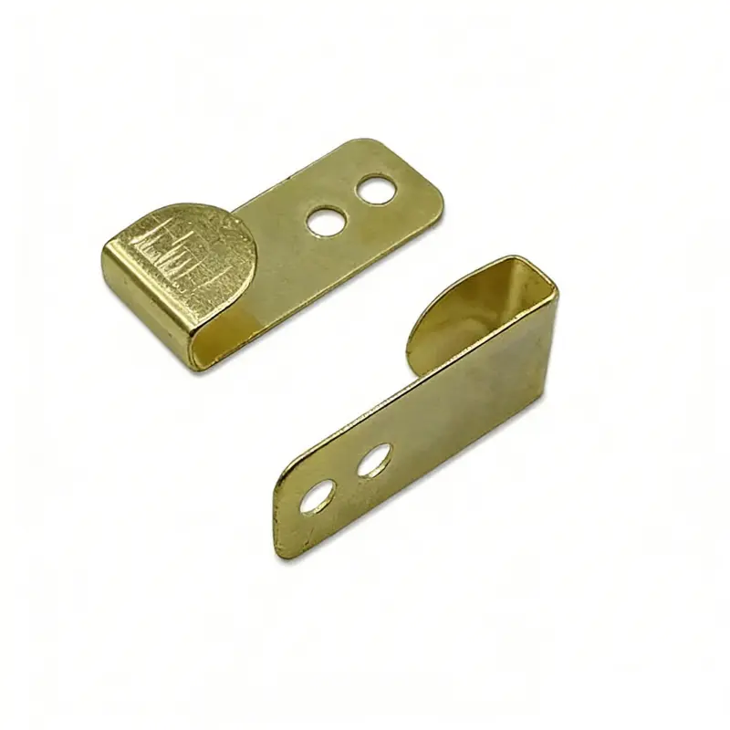 Close up of 2-Hole Gold D-Ring Hanger for wall mounting.