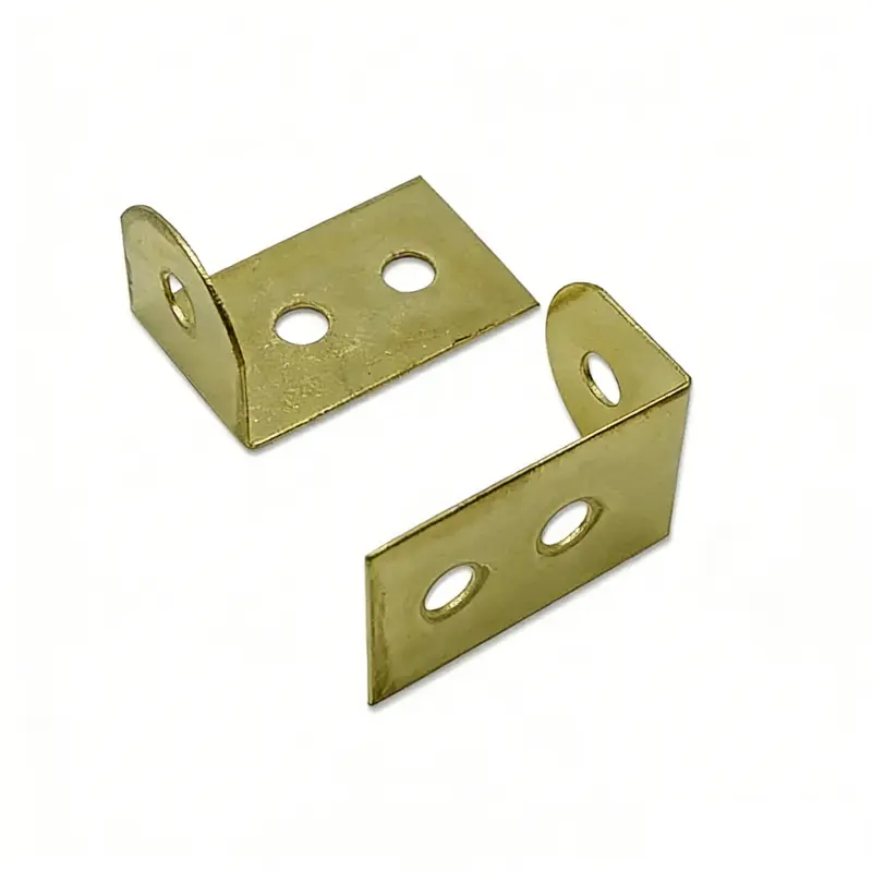 Close up of Gold Square Corner Guard for picture frames.